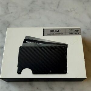 Ridge slim RFID Blocking Wallet with money clip. 
Carbon Fiber 3k  New in Box